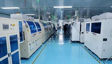 RONEN factory - LCM assembly line with operators in clean-room garments